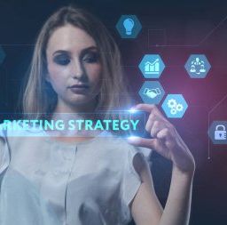 The concept of business, technology, the Internet and the network. A young entrepreneur working on a virtual screen of the future and sees the inscription: marketing strategy