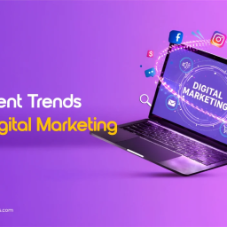 A laptop displaying the text 'DIGITAL MARKETING' on its screen, surrounded by floating icons for various social media and web platforms (like Facebook, Instagram, LinkedIn, YouTube). Text on the left reads: 'Recent Trends In Digital Marketing'.