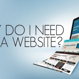 Image of a computer monitor displaying a colorful website with the text 'Why Do I Need a Website?' emphasizing the importance of having an online presence.